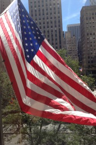 American Flag waving over Rockefeller Center, NY